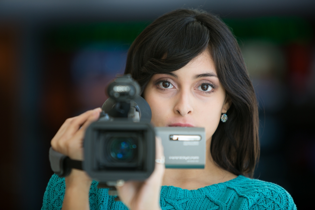Communications & Media Student Shooting Video