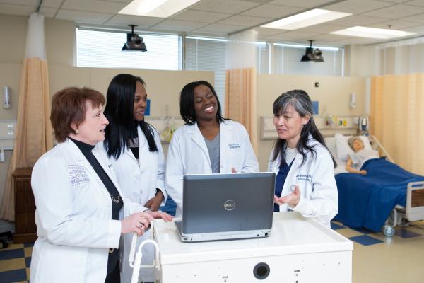 Nursing students in the simulation lab
